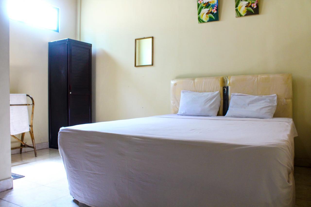 Lolo Beach Inn Легиан Екстериор снимка